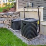 Two outdoor air conditioning units that need a tune-up, in Charlottesville Virginia